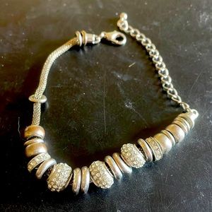 Silver bracelet with silver beads and cubic zirconia stones